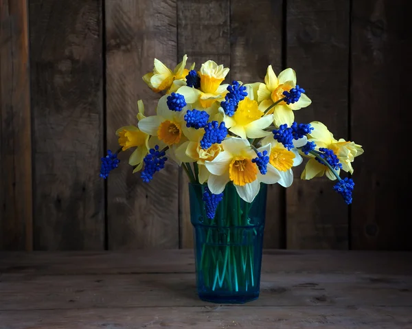 Still life with a bouquet of yellow narcissuses