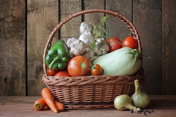 Vegetables in a basket. Ingredients for preparation of marrow caviar.