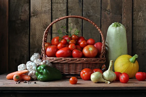 Vegetables in a basket. Ingredients for preparation of marrow caviar.