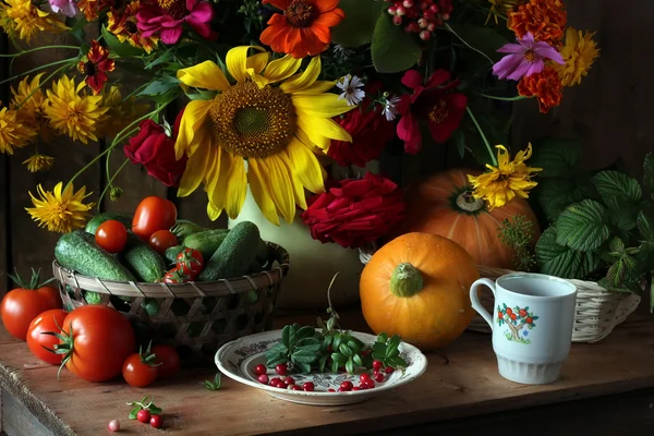 Still life with a bouquet of cultivated flowers