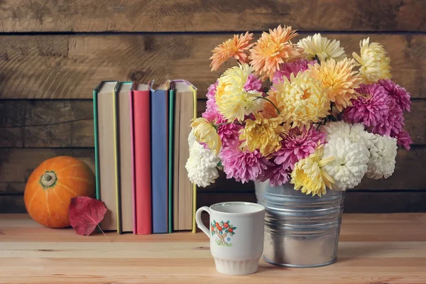 Still life with a bouquet of chrysanthemums.