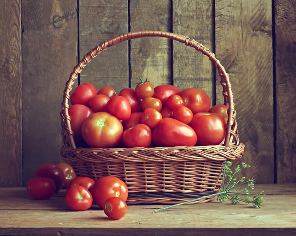 Basket with tomatoes. Vegetables in a basket.