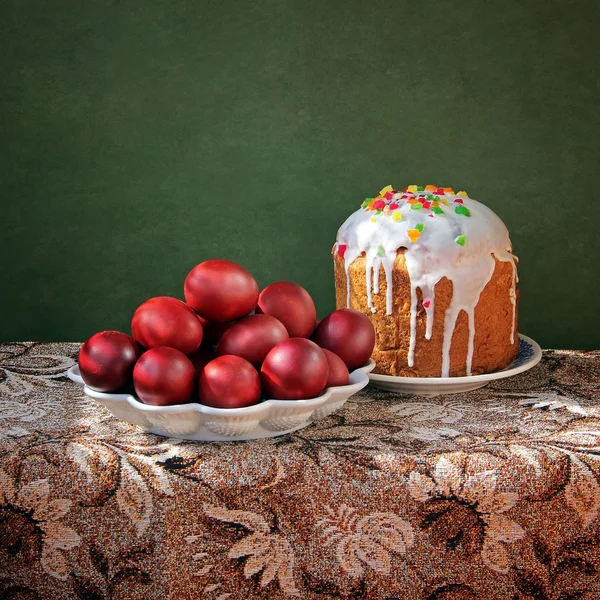 Still life with Easter eggs and an Easter cake