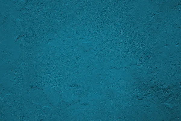 Blue background. Grunge texture. Blue wall.