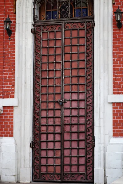 The high Gothic door with lattices locked.