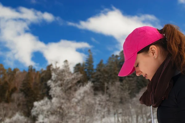 Portrait of a girl in pink cap