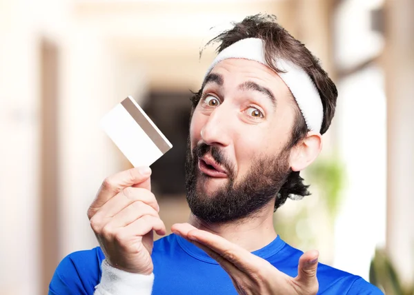 Crazy sports man with credit card