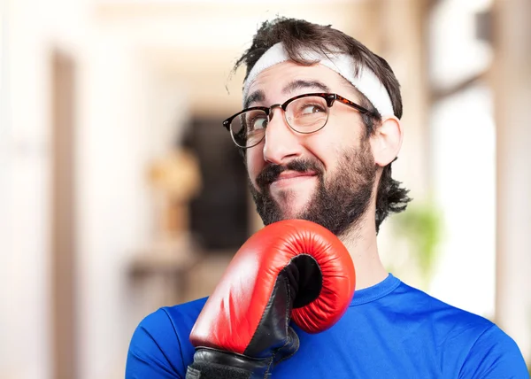 Crazy sports man with boxing glove