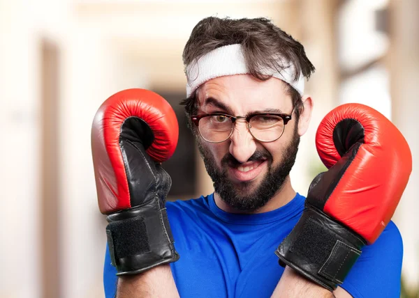 Crazy sports man in boxing gloves