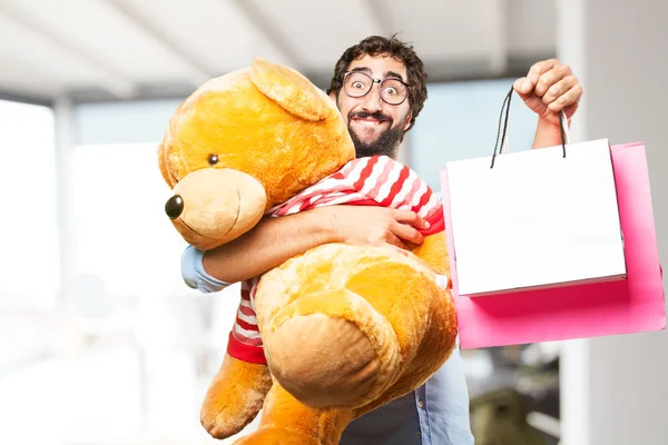 Crazy man with toy bear