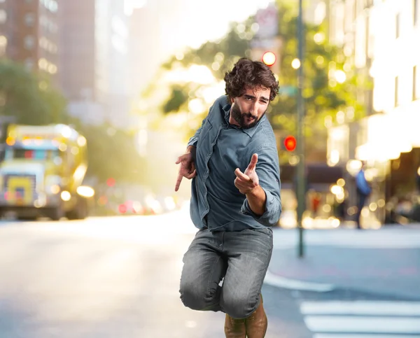 Crazy man jumping with happy expression