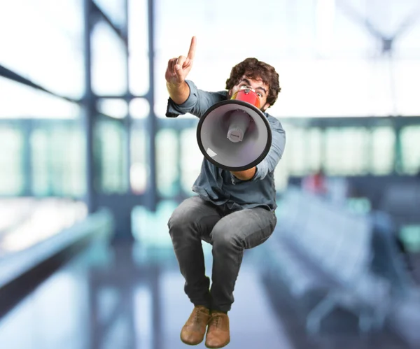 Crazy man with megaphone