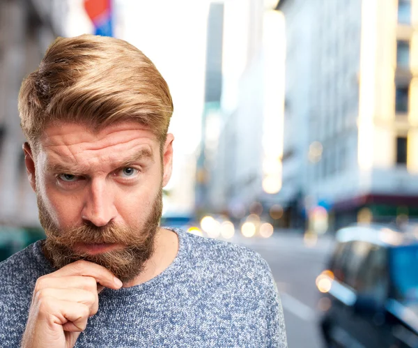 Young crazy man with worried expression