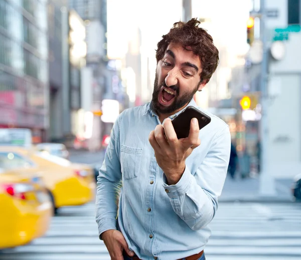 Crazy man with mobile phone