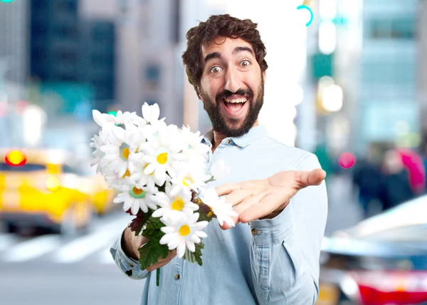 Young man with bouquet of flowers