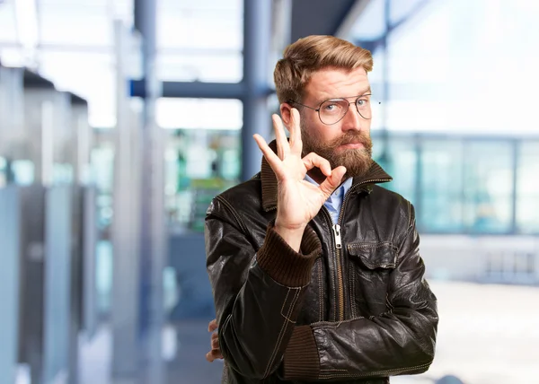 Blonde man with happy expression