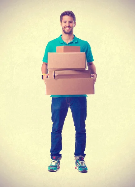 Guy holding a cardboard boxes