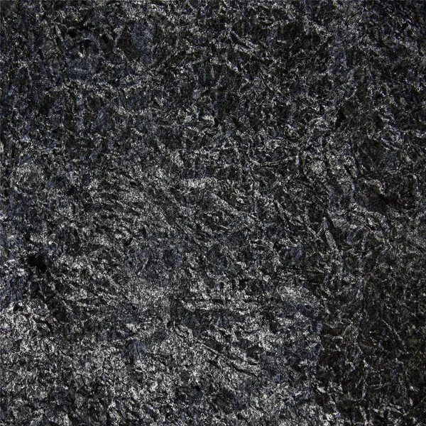 Black glossy rock texture