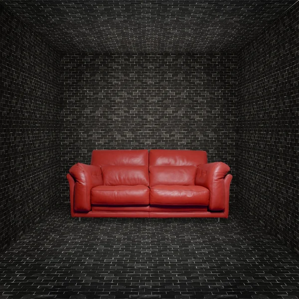 Red leather sofa into brick room
