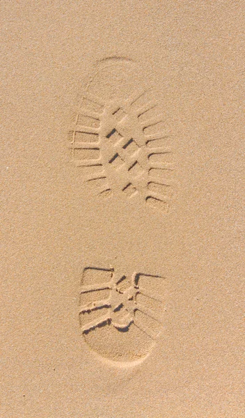 Shoe foot print on sand