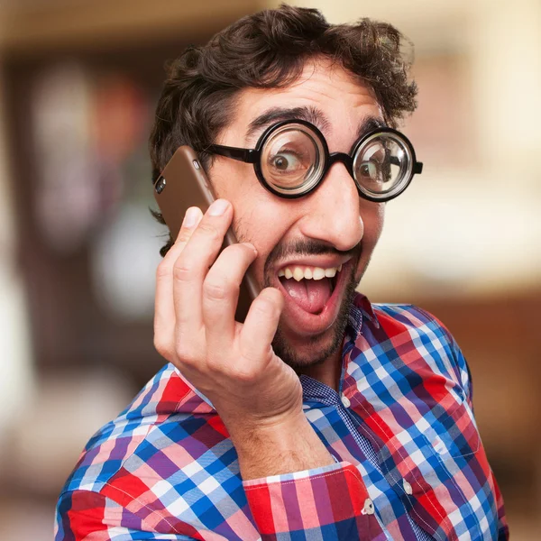 Happy man speaking on phone