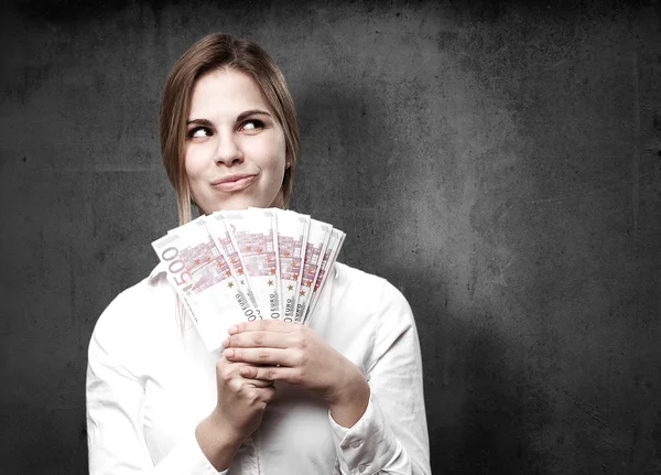 Blond woman with money