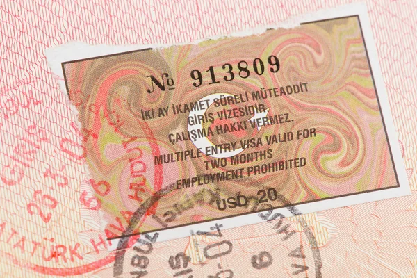 Passport page with Turkey visa and immigration control stamp.