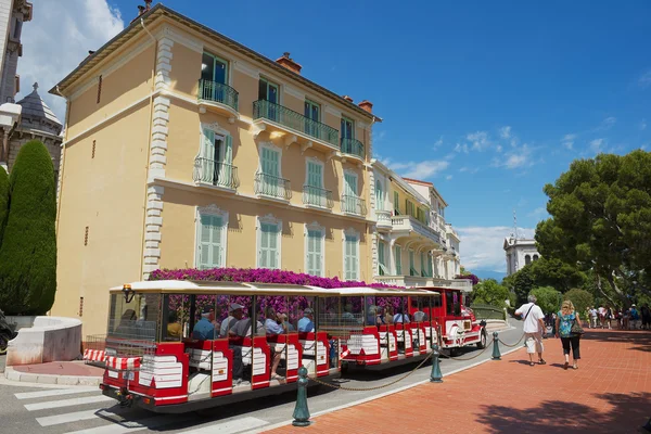People enjoy excursion with the sightseeing train in Monaco, Monaco.