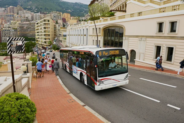 Public transportation bus passes by the street in Monaco, Monaco.