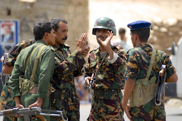 Yemeni military talk at the security checkpoint, Hadramaut valley, Yemen.