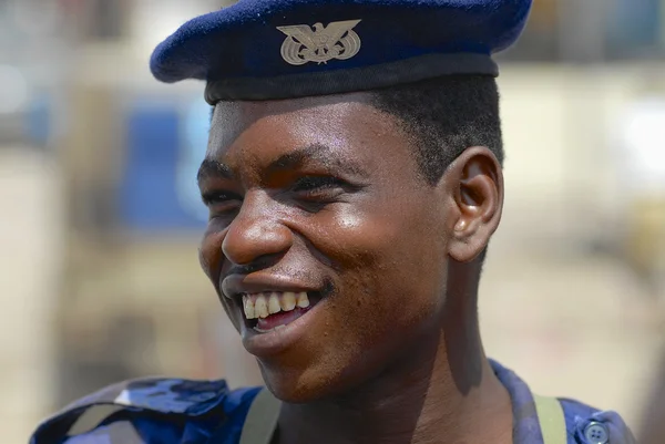 Portrait of unidentified Yemeni military man smiling in Aden, Yemen.