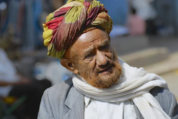 Portrait of unidentified man in a turban at the street in Taizz, Yemen.