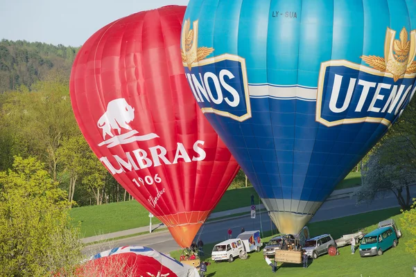 People fly with the hot air balloon in Vilnius, Lithuania.