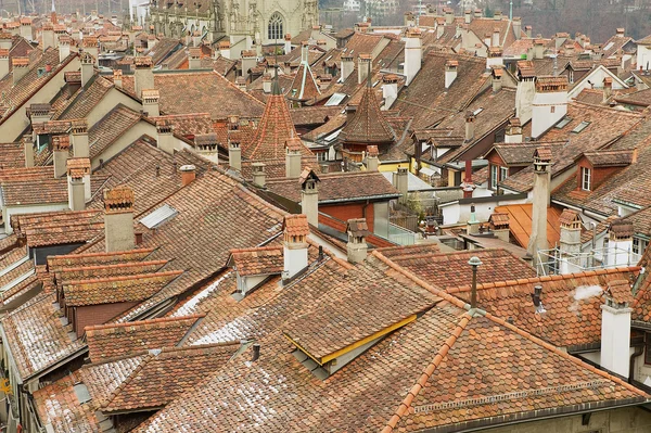 View to the roofs of the historical buildings from the famous Clock tower in Bern, Switzerland.