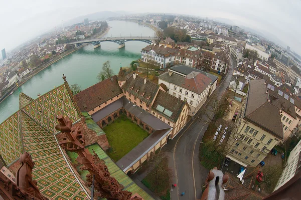 Wide angle aerial view to Basel city from Munster tower on a rainy day in Basel, Switzerland.