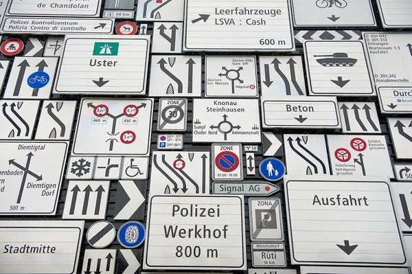 Display of the traffic signs at the exterior wall of the Swiss Museum of Transport in Lucerne, Switzerland.