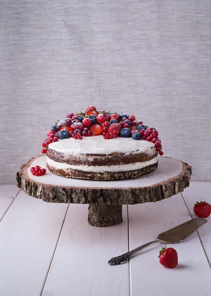 Home made Earl Grey naked cake with cream cheese and berries