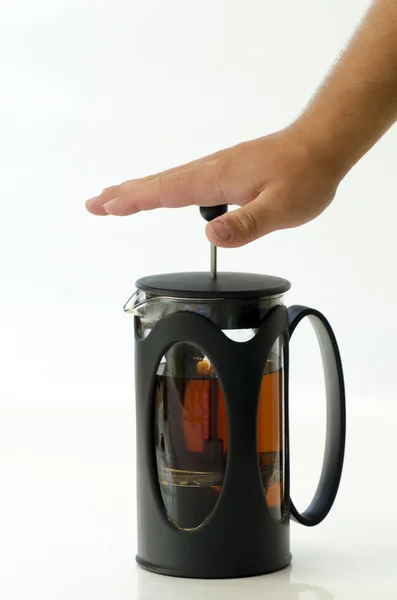 Hand pull french press for making tea isolated