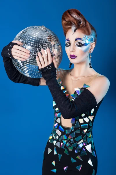 Beautiful woman with stylish hair style art make up disco ball
