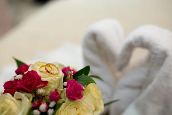 Bouquet and Two Wedding Rings