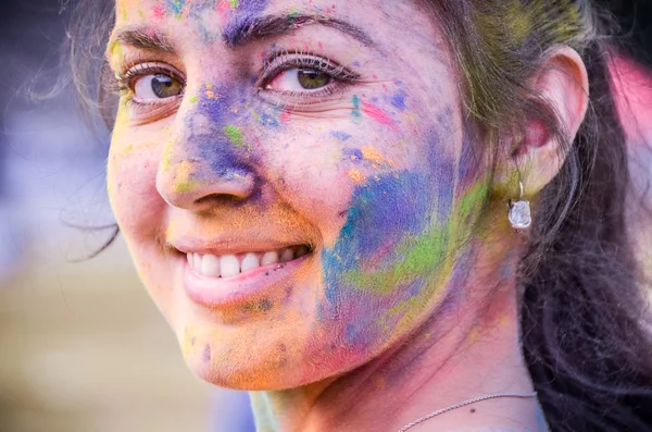 PENZA, RUSSIA - SEPTEMBER 6, 2015: People covered in paint on Holi festival in Russia