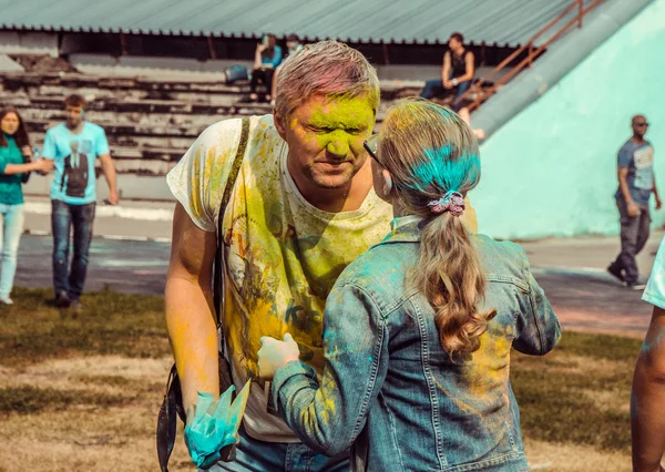 PENZA, RUSSIA - SEPTEMBER 6, 2015: Young people at festival of colors Holi in Russia