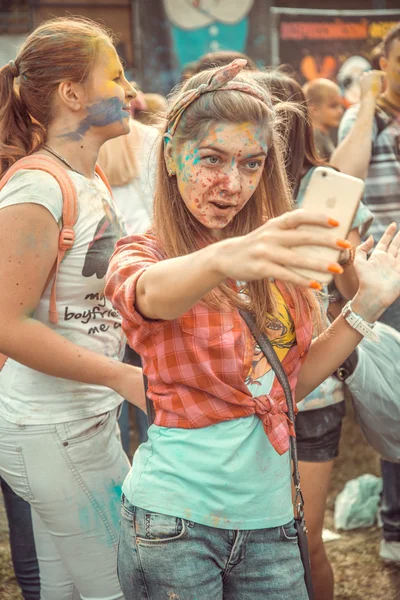 PENZA, RUSSIA - SEPTEMBER 6, 2015: Lathmar Holi. Young people celebrated Holi festival of colors in Russia