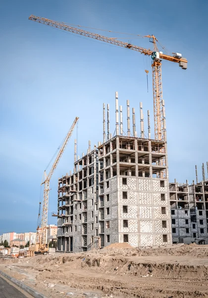 Construction of highrise houses and lifting crane