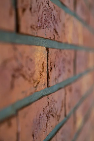 Interior brick wall close up with shallow depth of field
