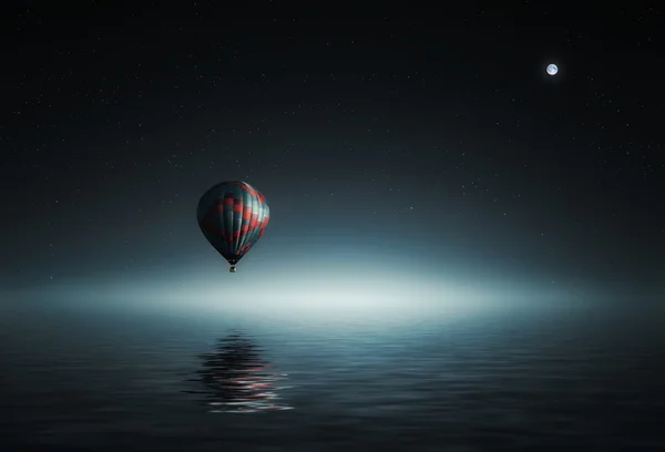 Air balloon flying over water