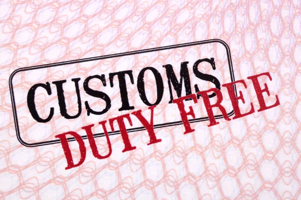 Customs duty free stamps on passport paper.
