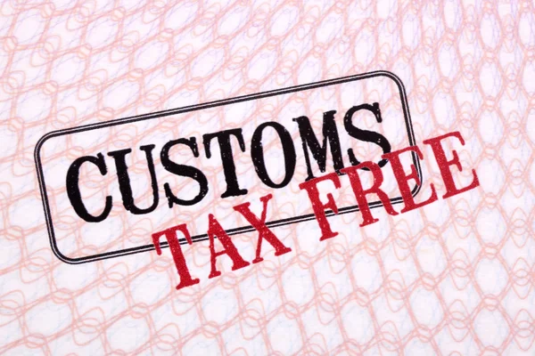 Customs tax duty free stamps on passport page close up
