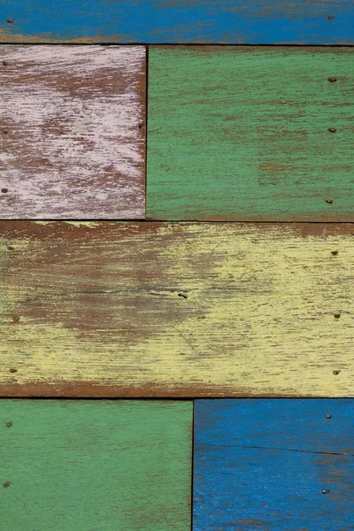 Detail of abstract art color wood wall yellow green