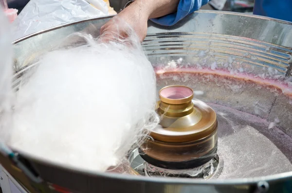Making cotton candy in cotton candy machine